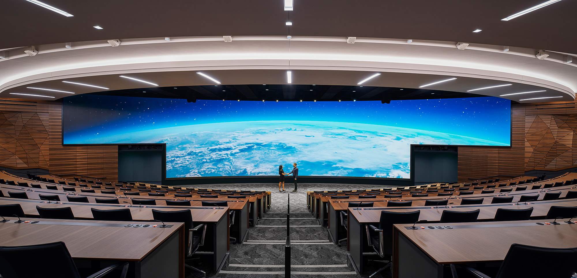 A large room with tables and chairs.