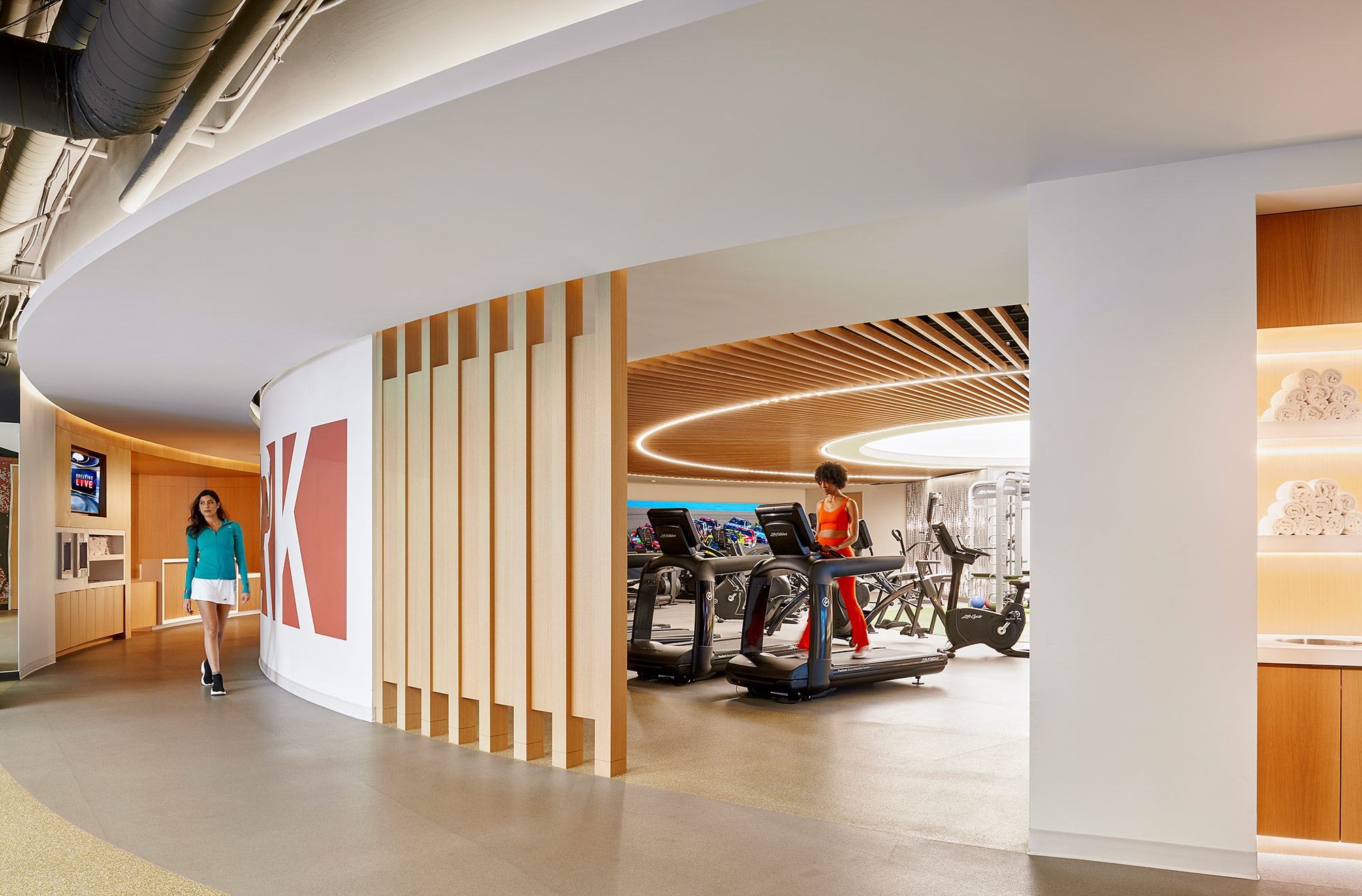 A few people in a building.