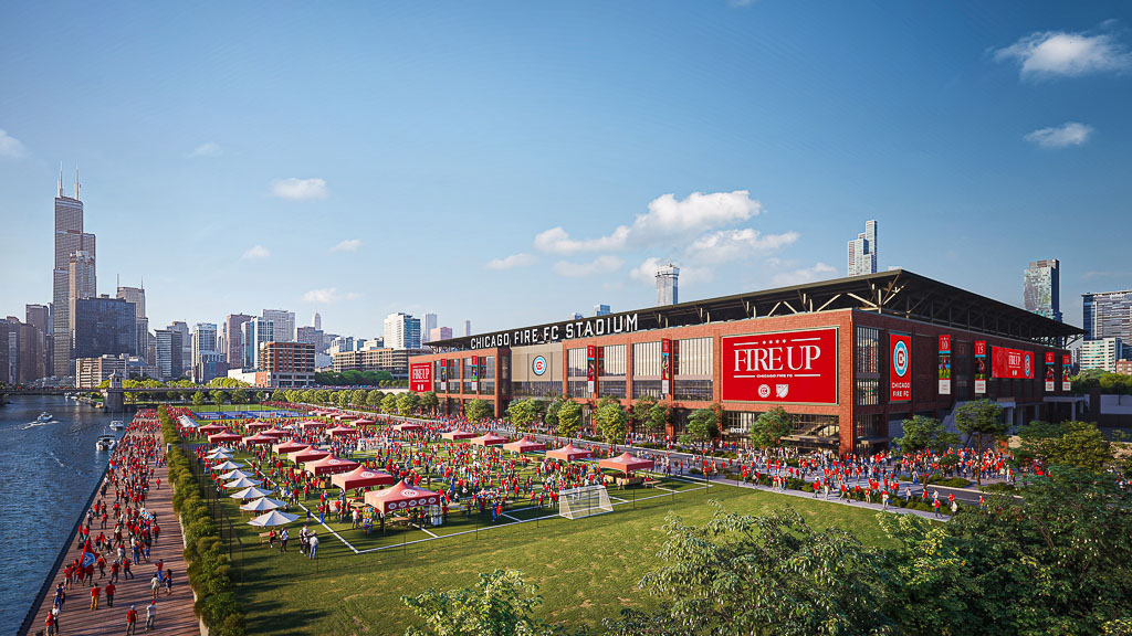 A large building with many umbrellas in front of it.