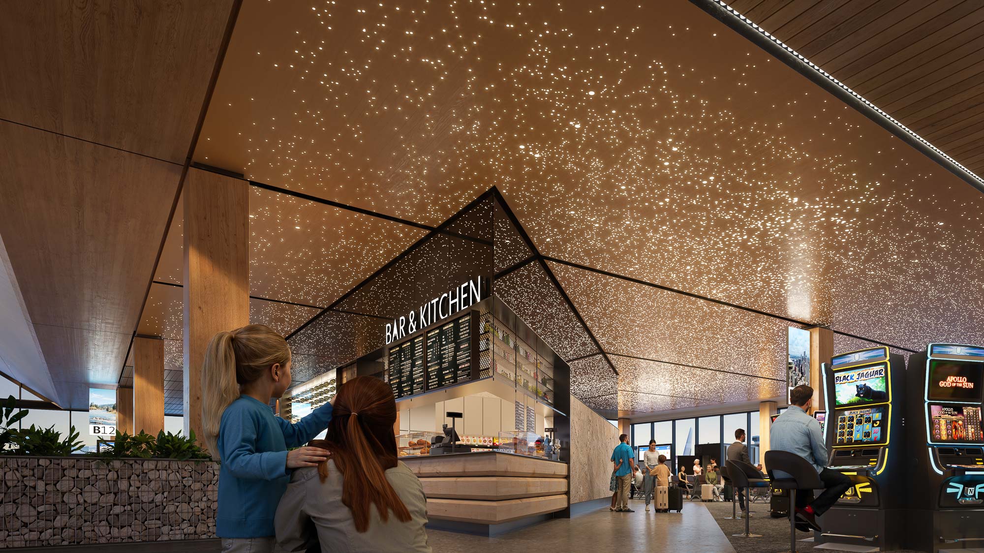 A couple of women looking at a display of a movie theater.