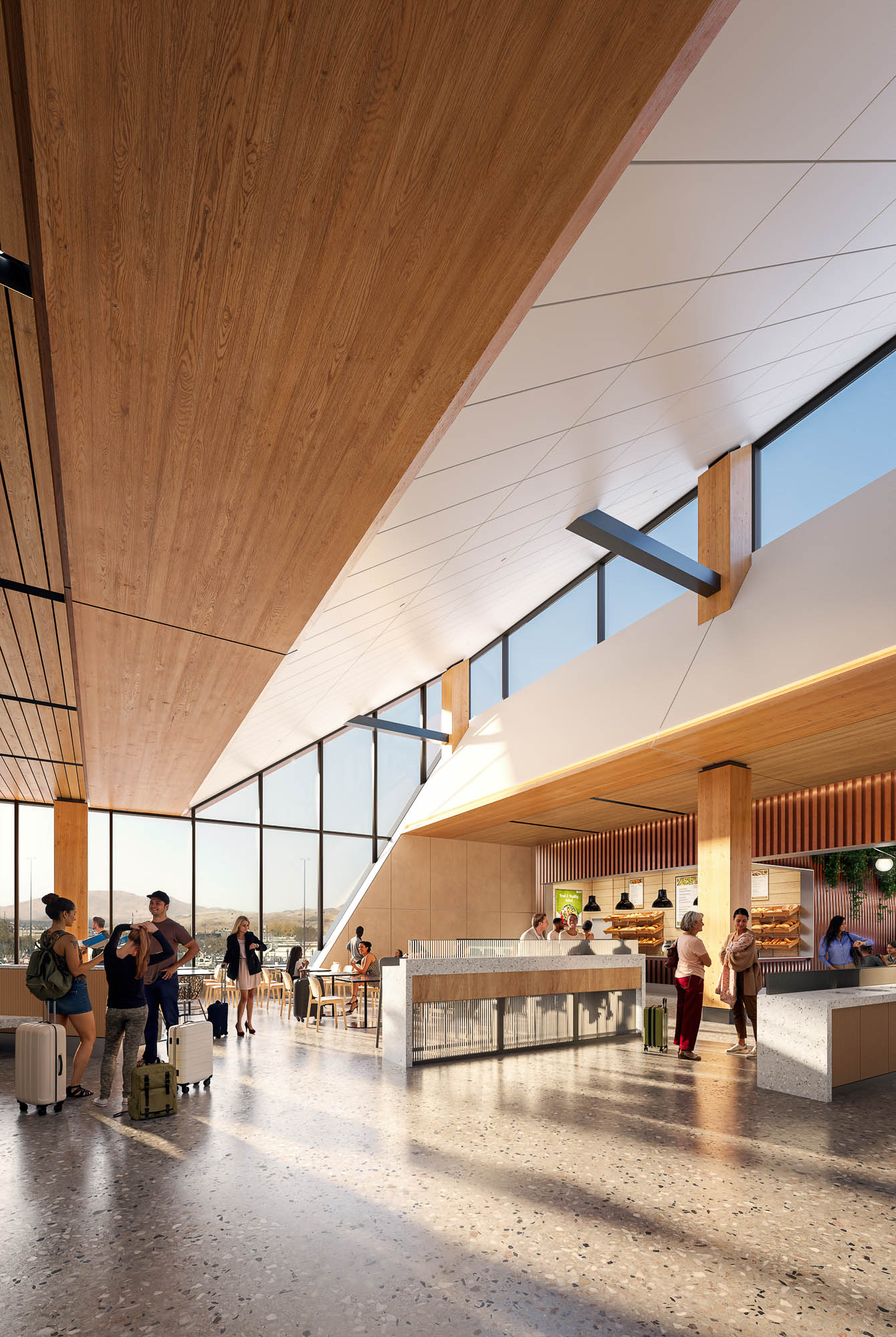 A group of people in a large room with a large ceiling.