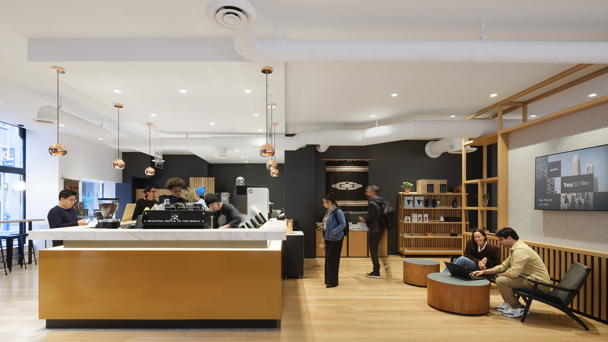 A group of people in a library.