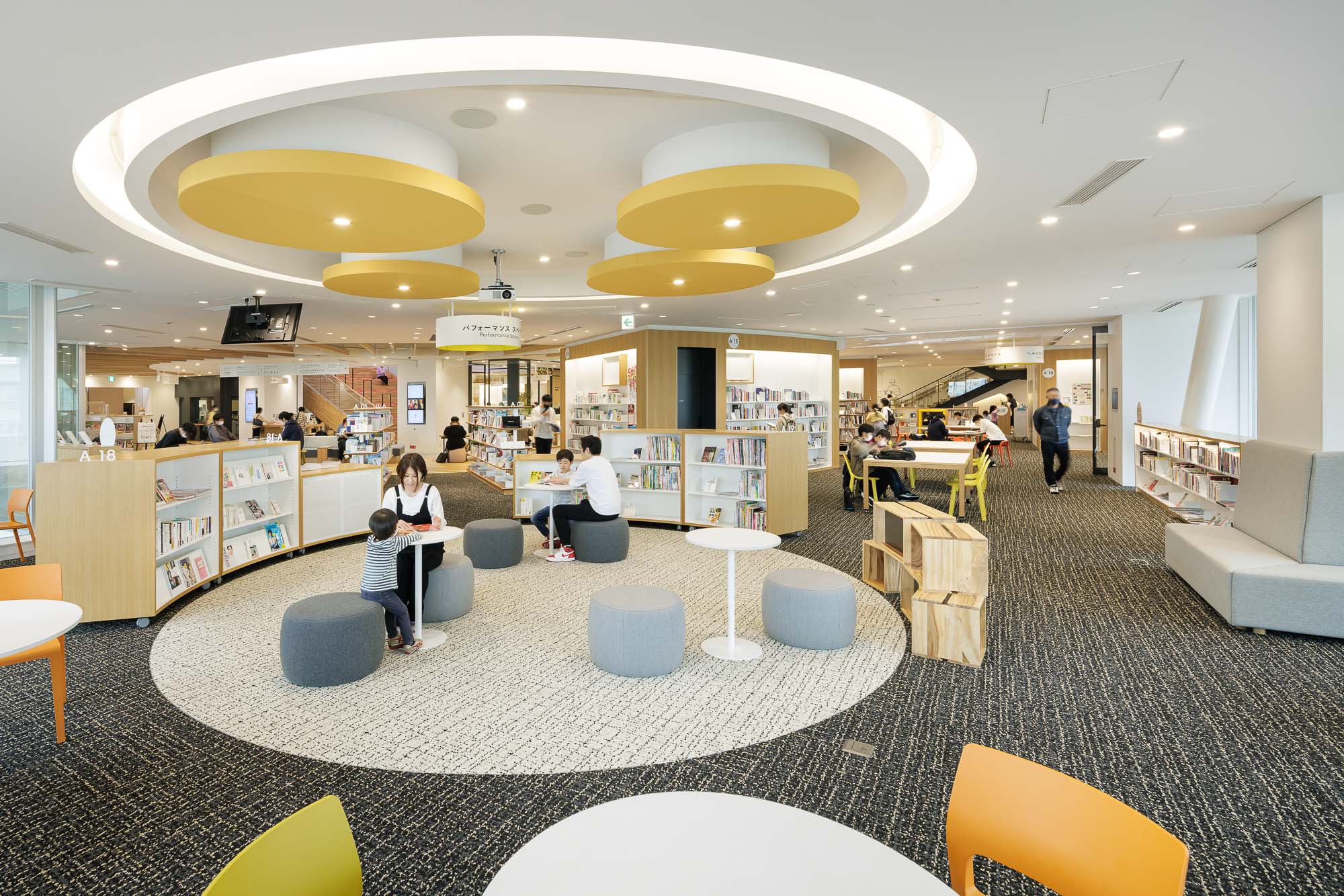 A large room with tables and chairs.