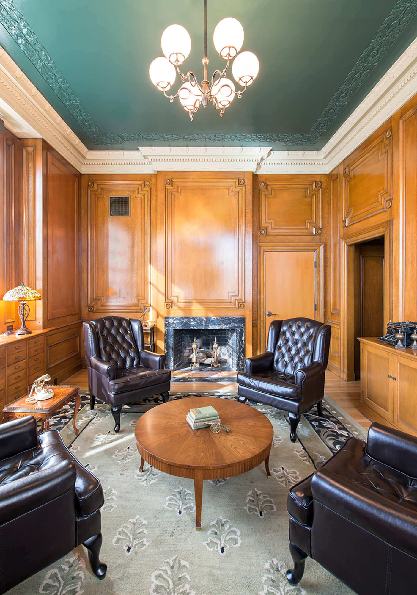 A living room with a fireplace.
