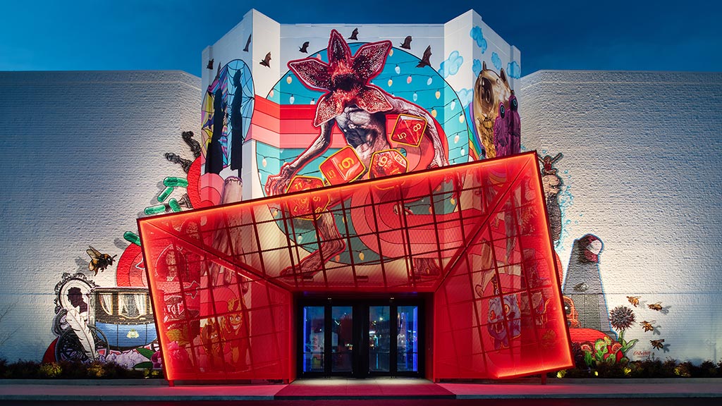 A colorful building with a mural.