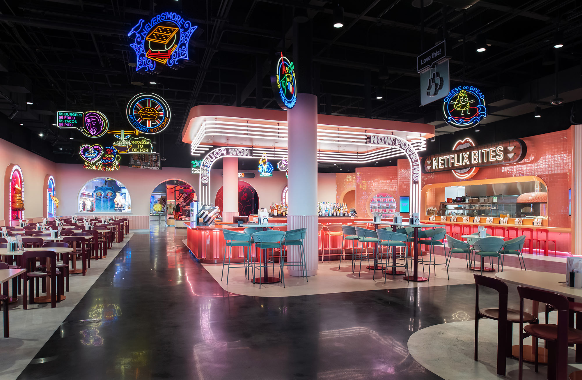 A large room with tables and chairs.