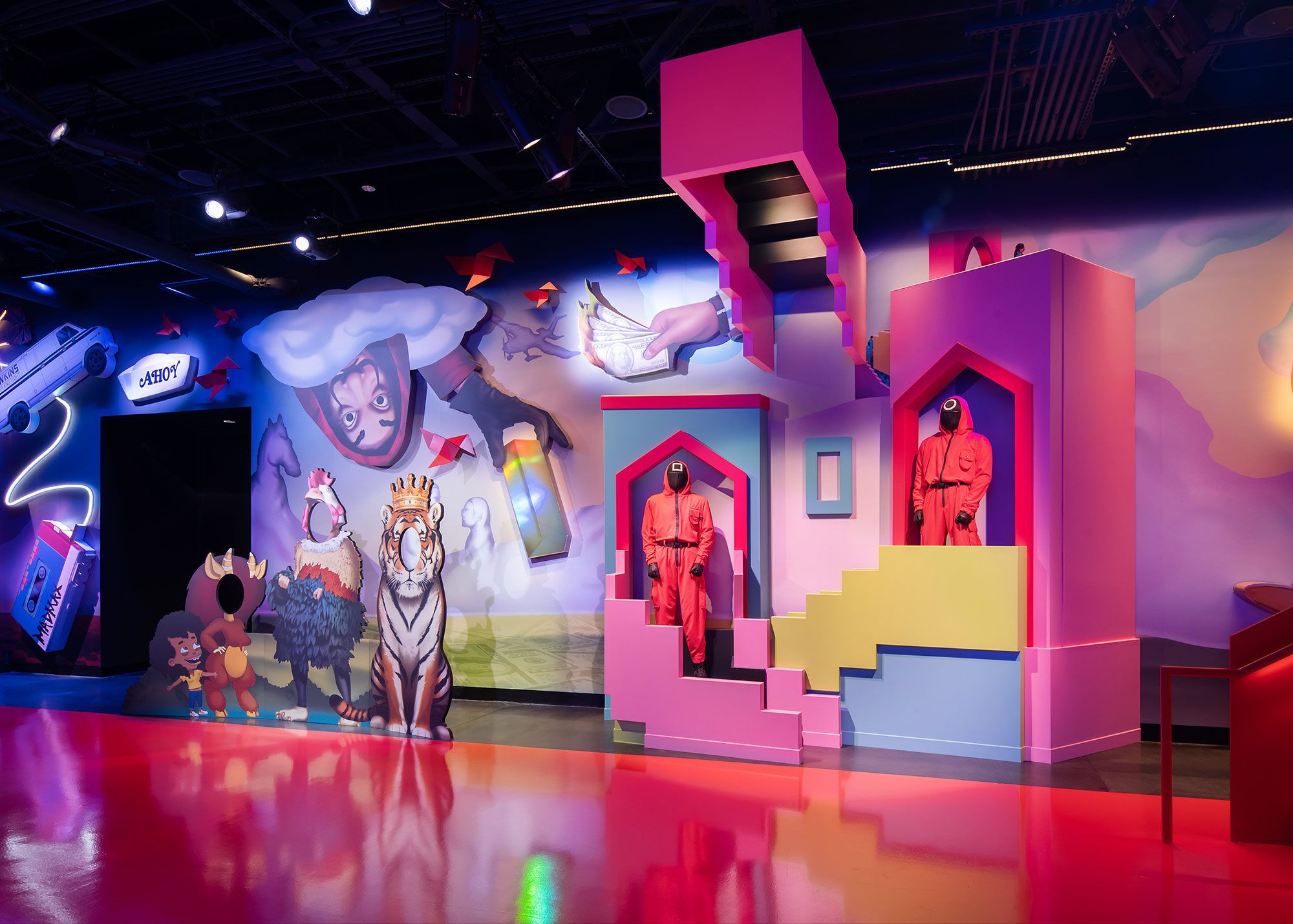 A group of people in clothing on a stage.