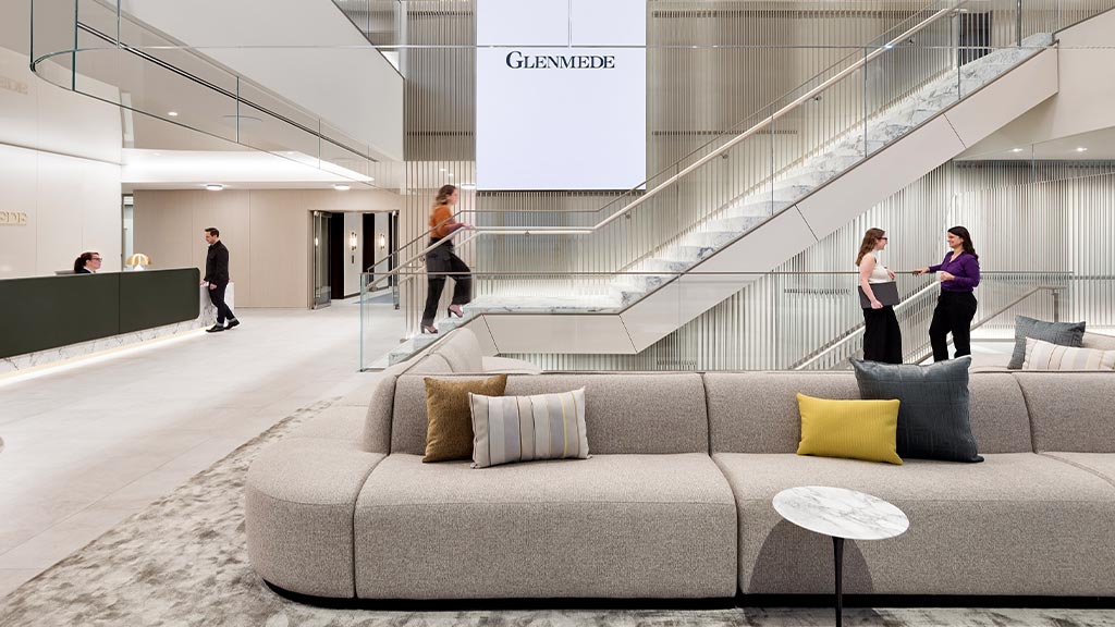 A group of people walking up a staircase.