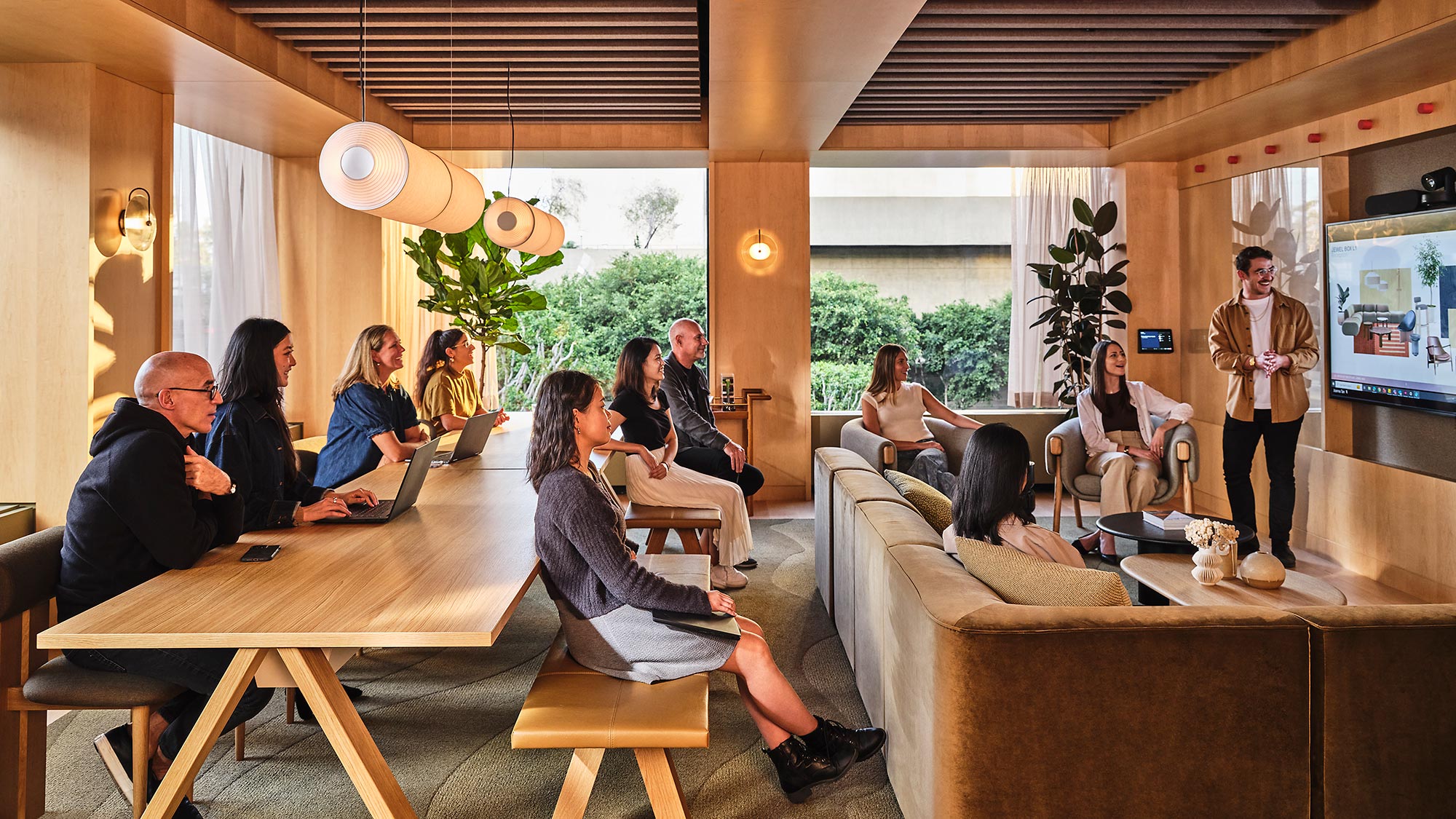 A group of people sitting in a room.