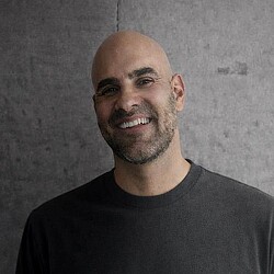 A man smiling for the camera.