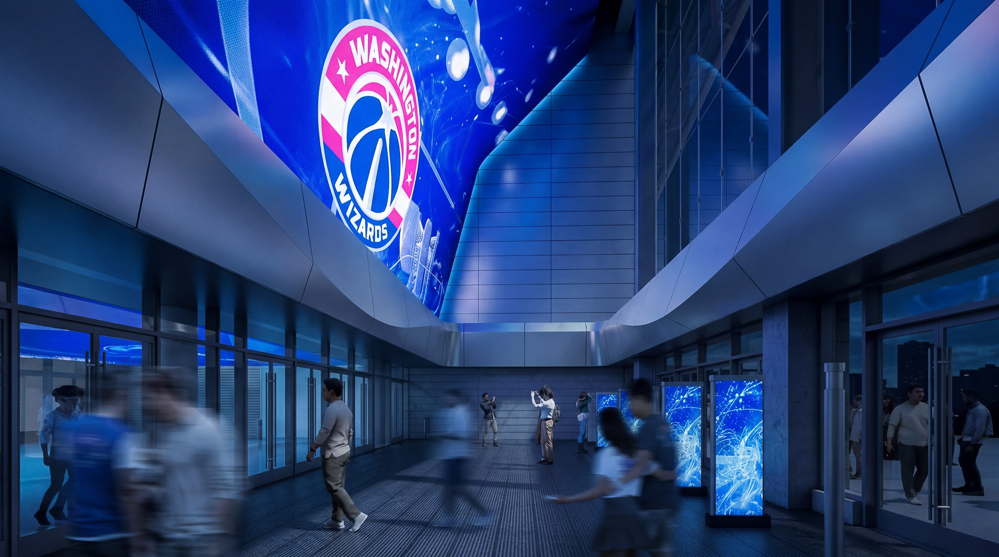 A group of people walking in a building.