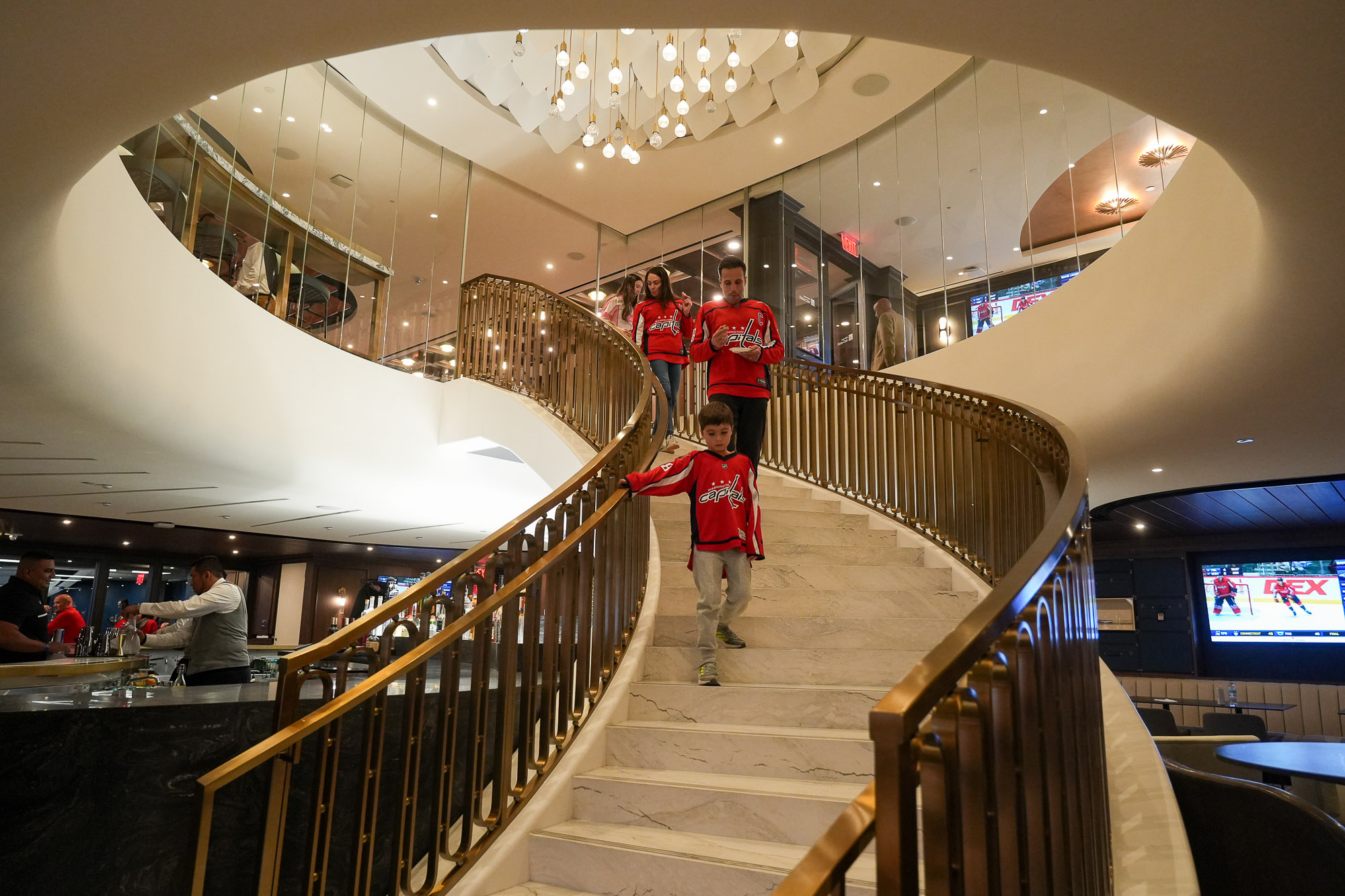 A group of people on a flight of stairs.