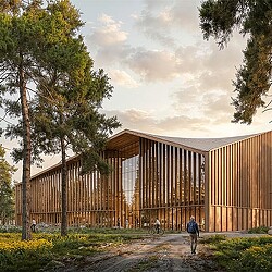 A person walking by a wooden building.