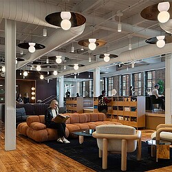 A person sitting on a couch.