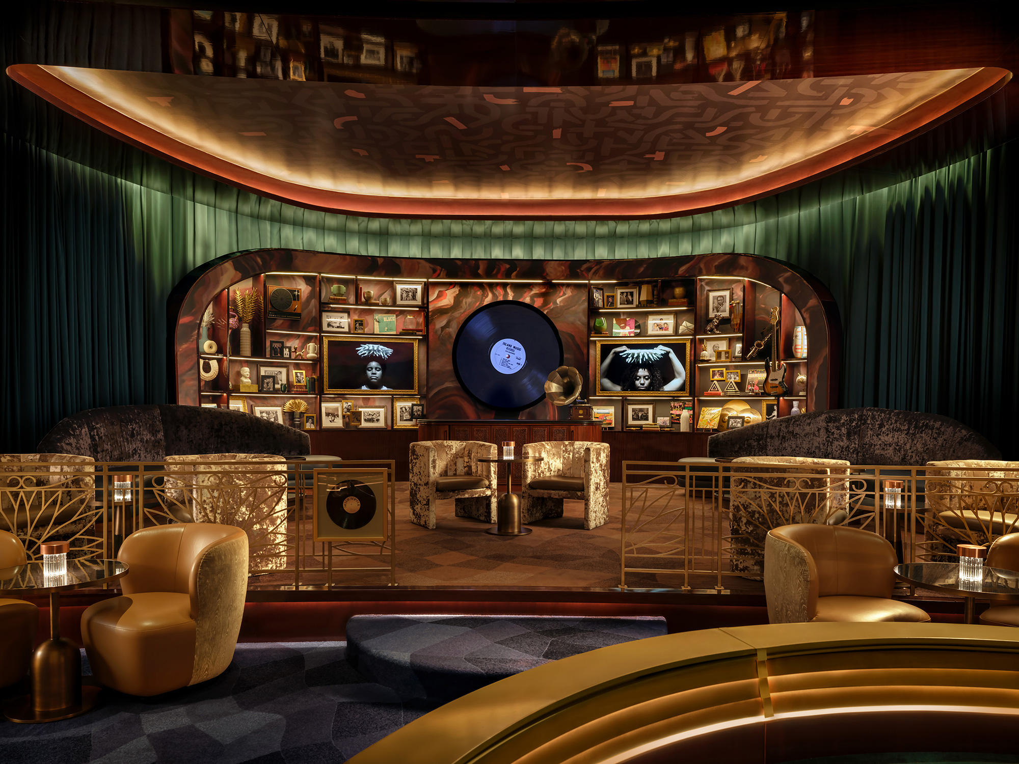 A room with a large screen and chairs.
