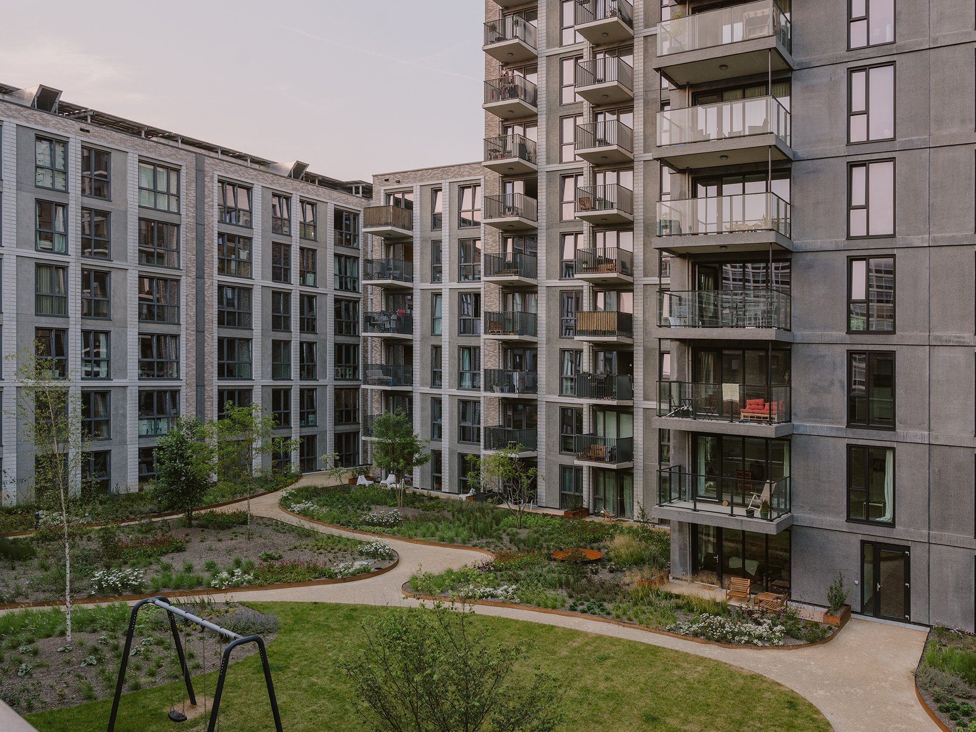 A building with a lawn in front.