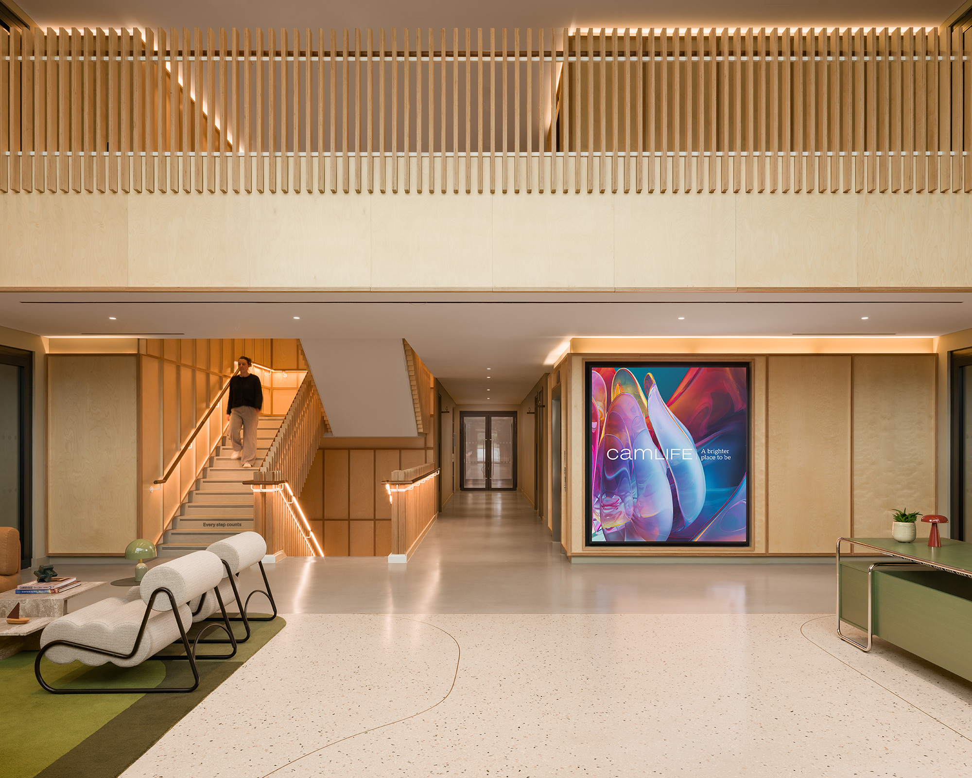 A person standing on a staircase.