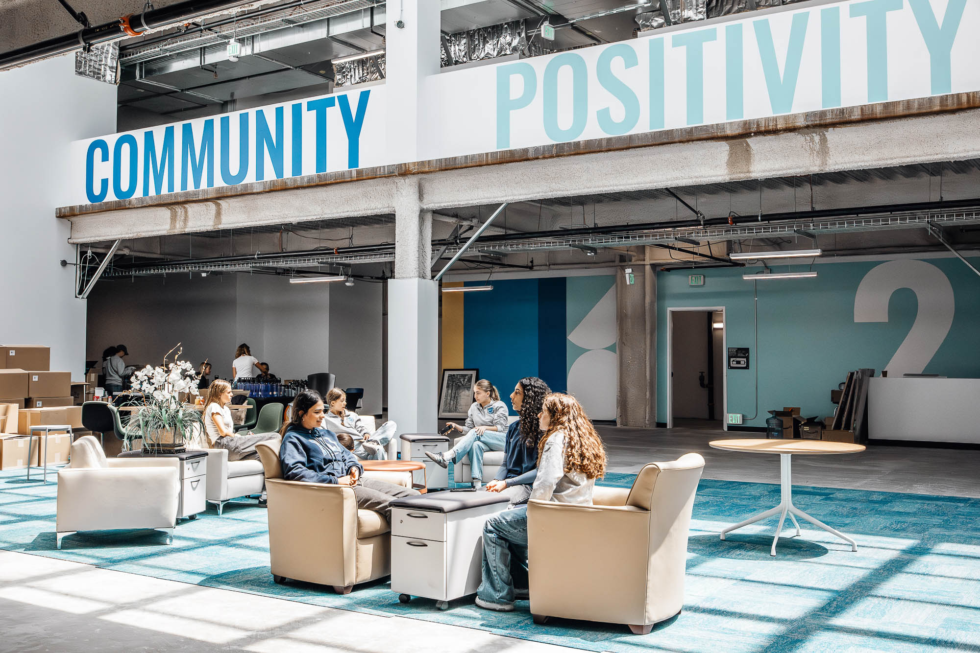 A group of people sitting in a room.