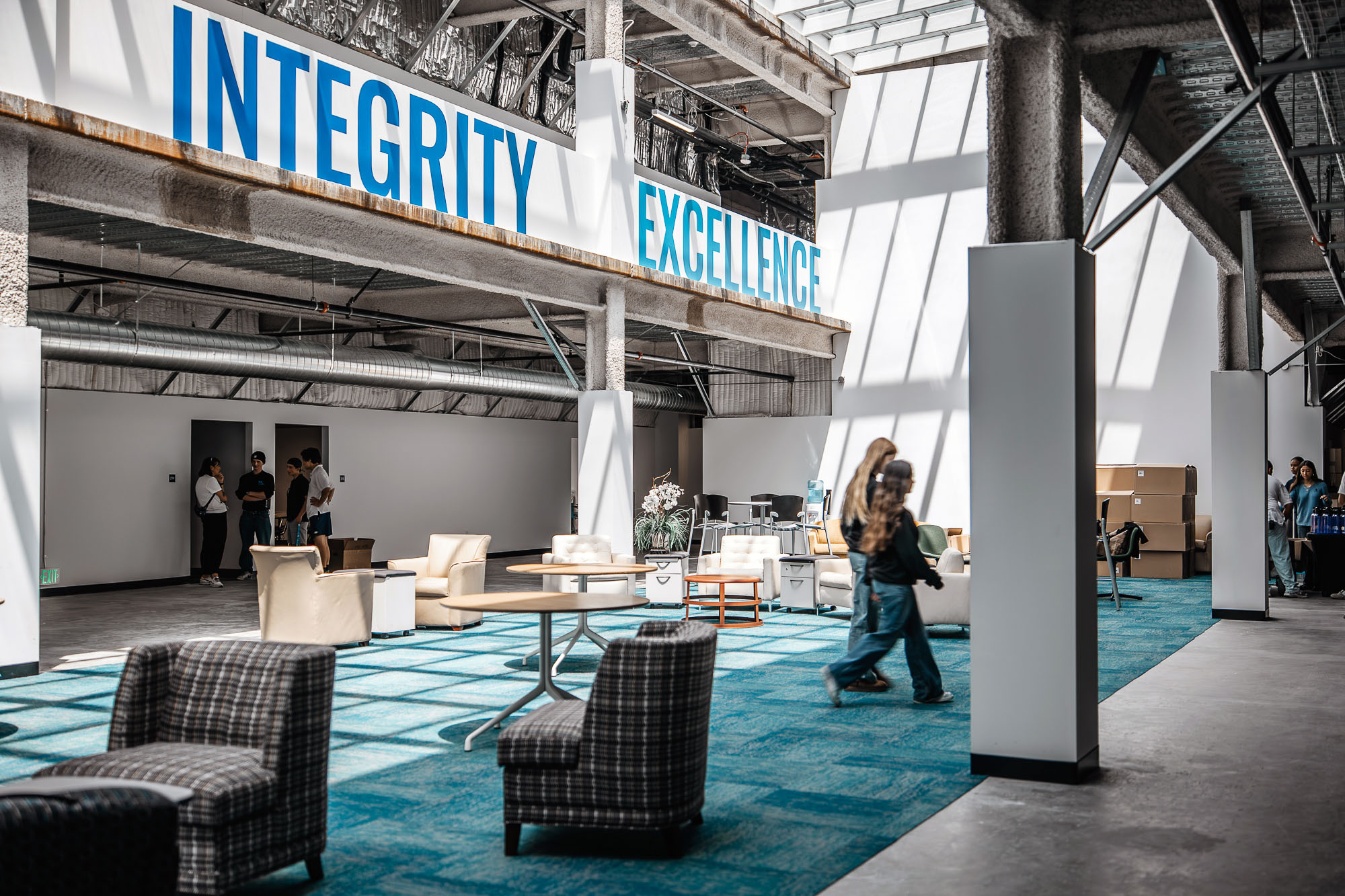 A person standing in a large building.