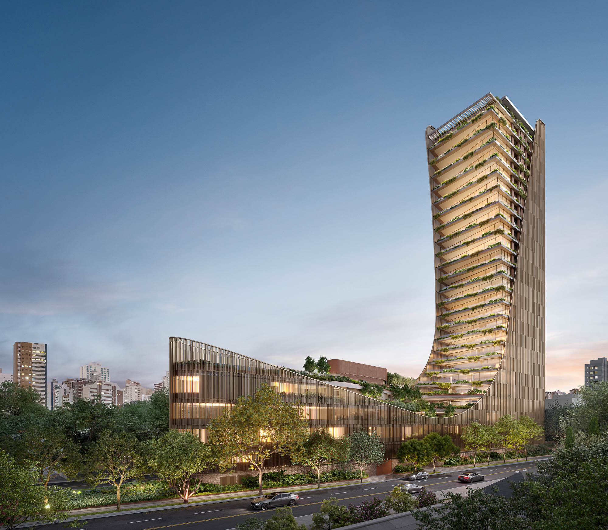 A tall building with a road and trees in front of it.