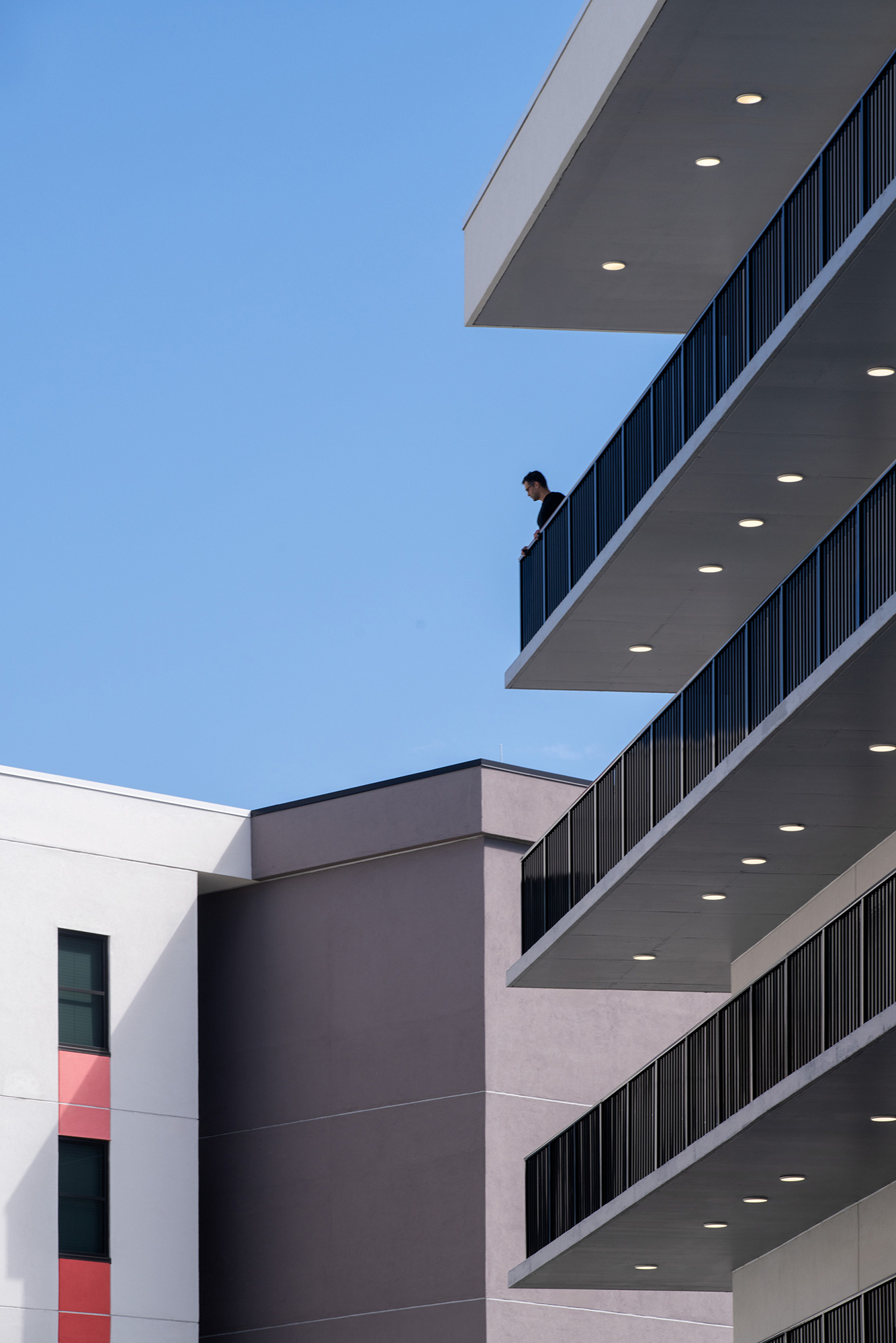 A person standing on a staircase.