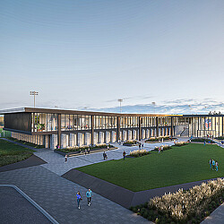 A large stadium with people walking around.