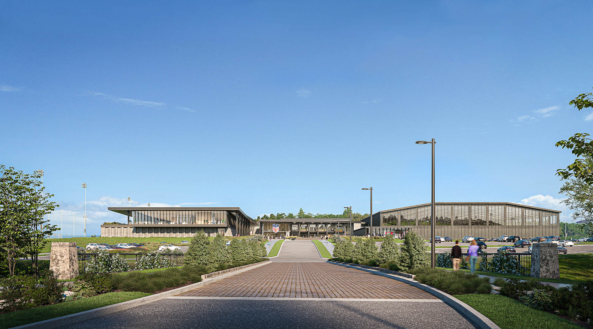 A courtyard with a building in the background.