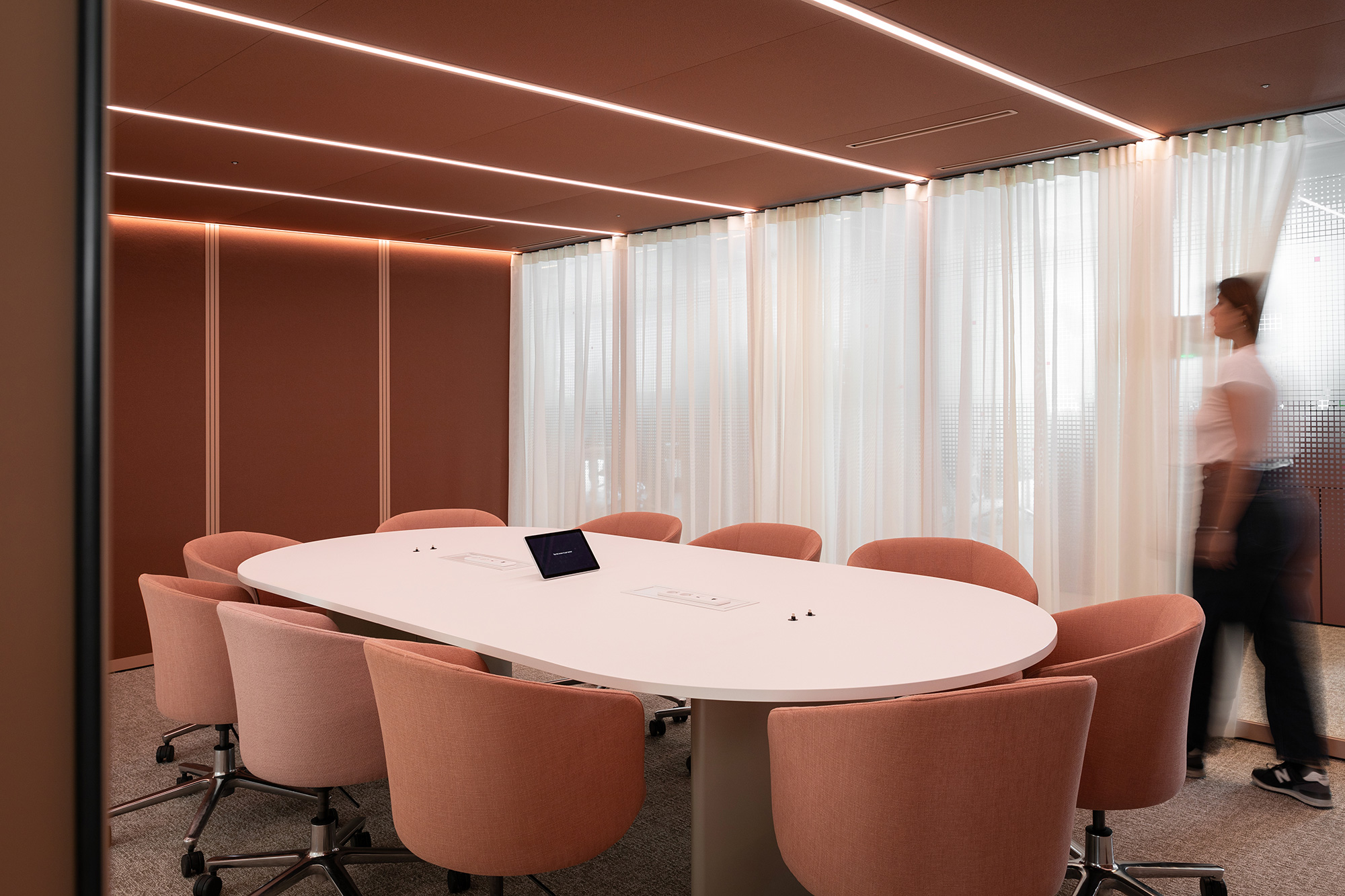 A room with a table and chairs.
