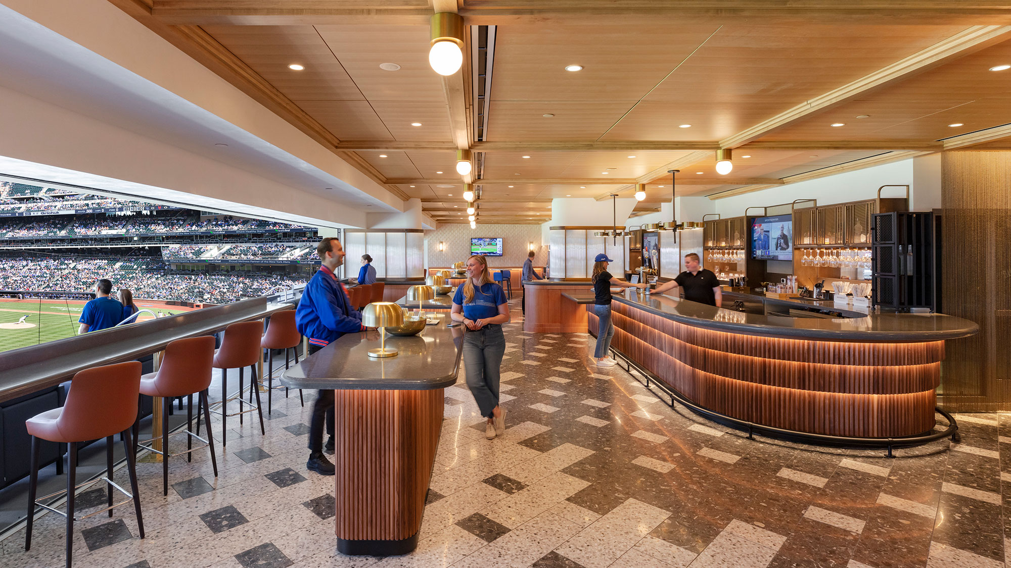 A group of people in a restaurant.