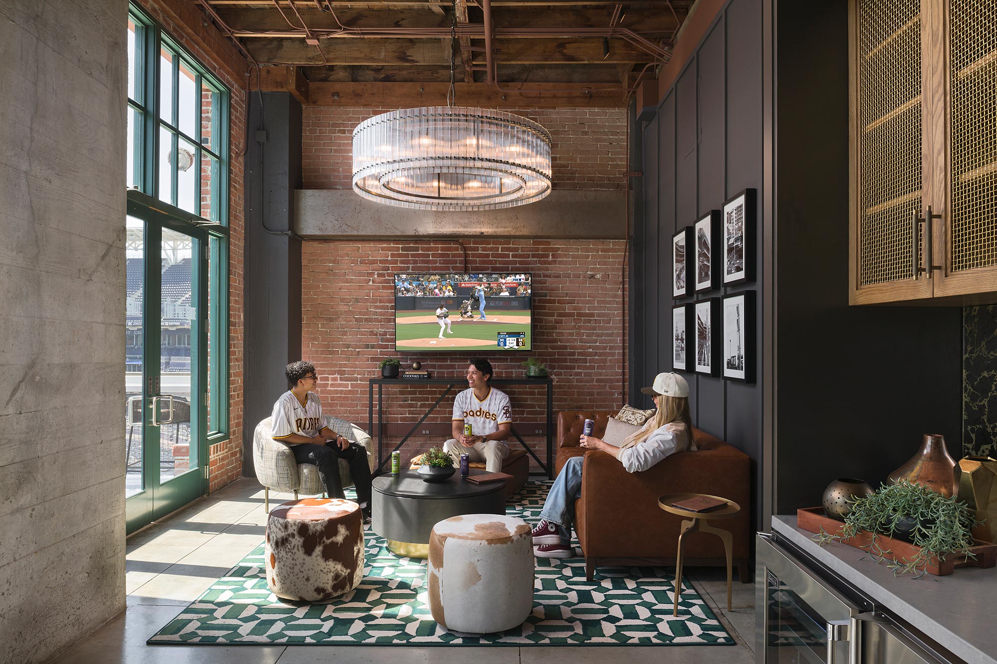 A few people sitting in a room.