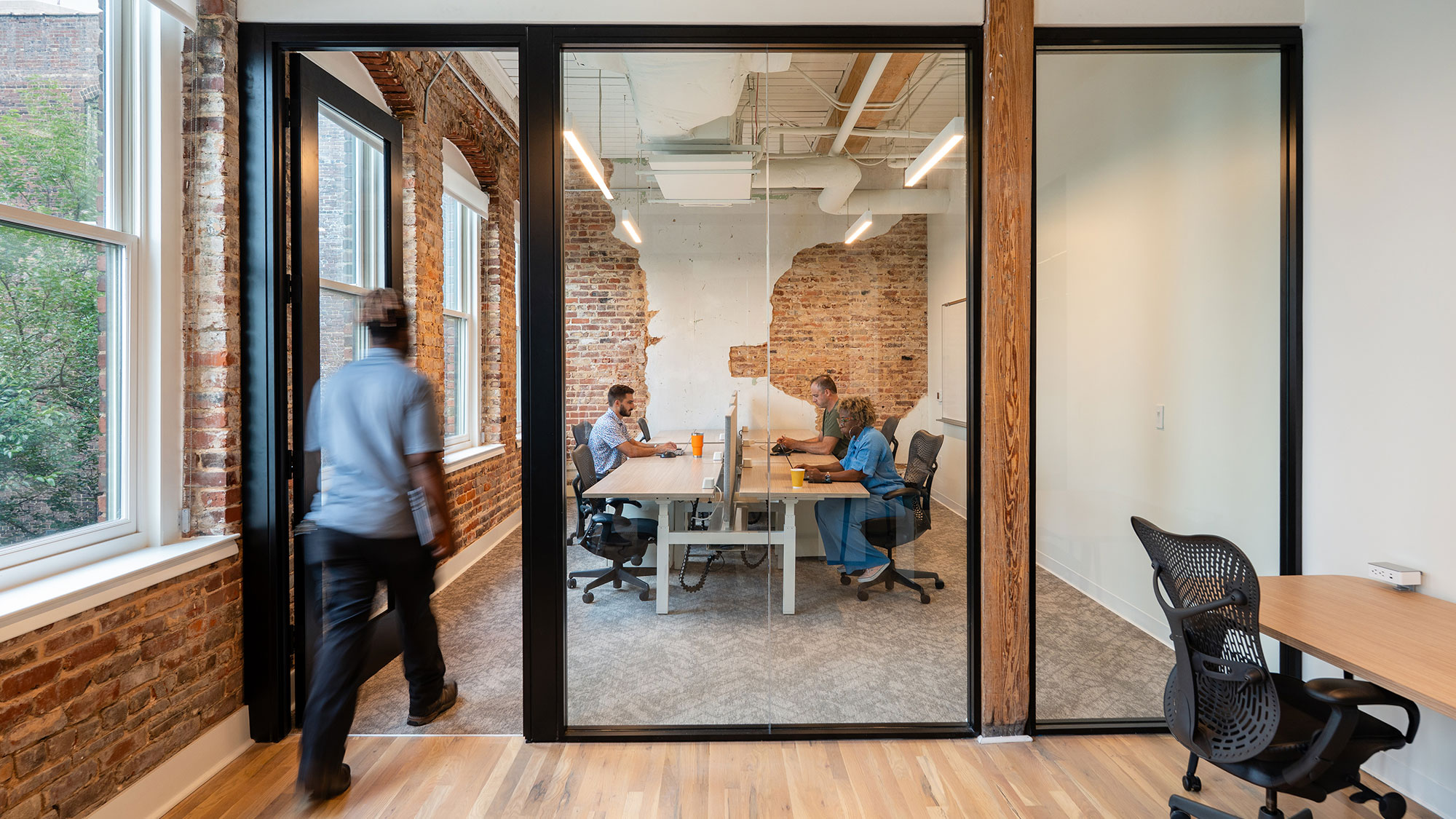 A group of people in a room.