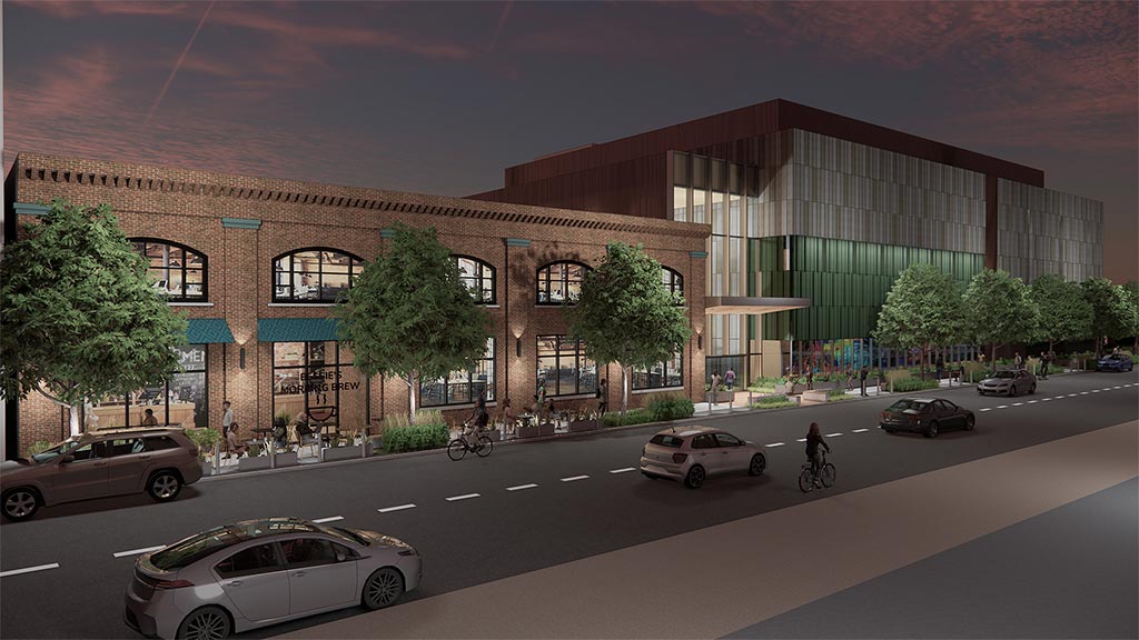 A building with cars parked in front.