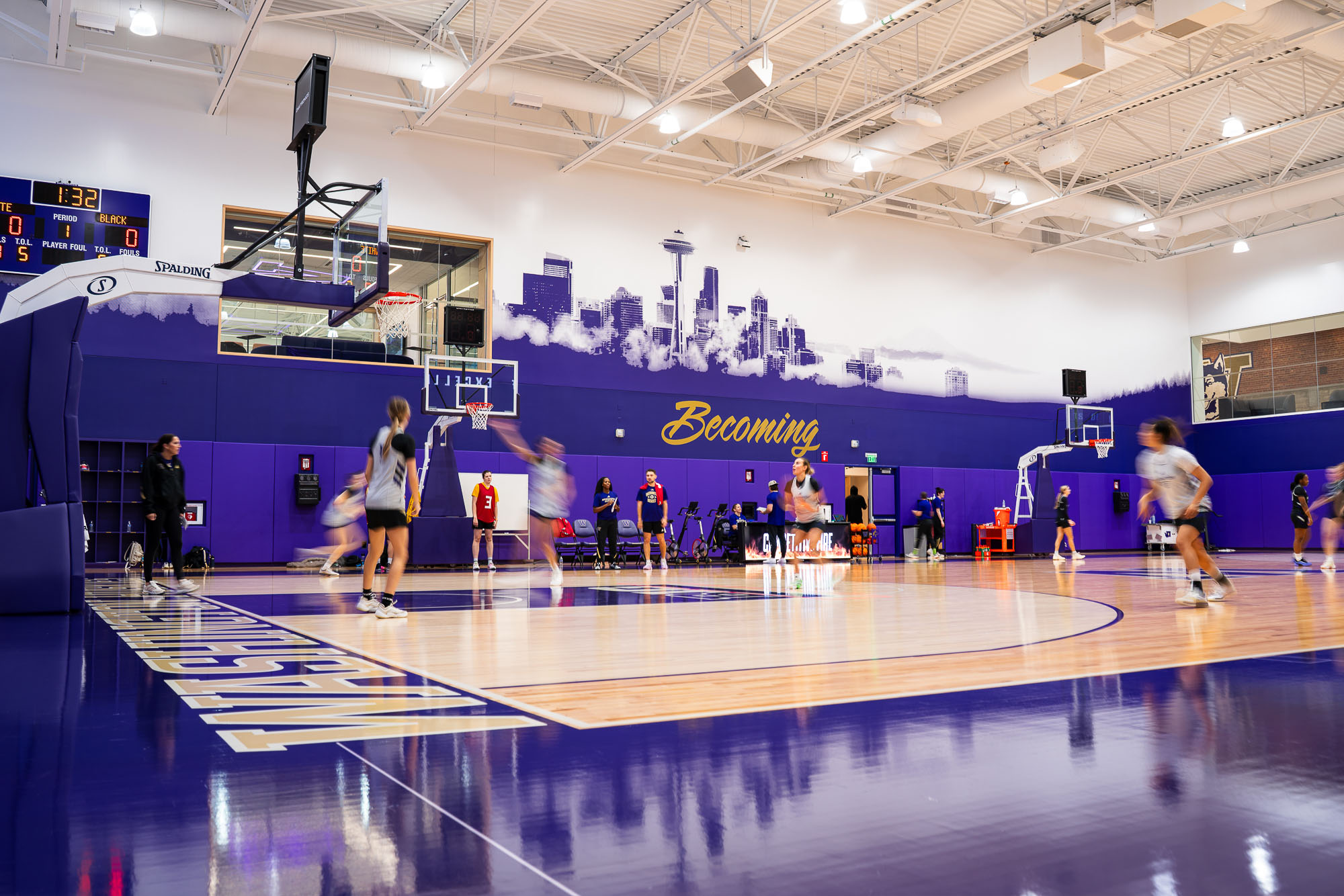 A group of people playing volleyball.