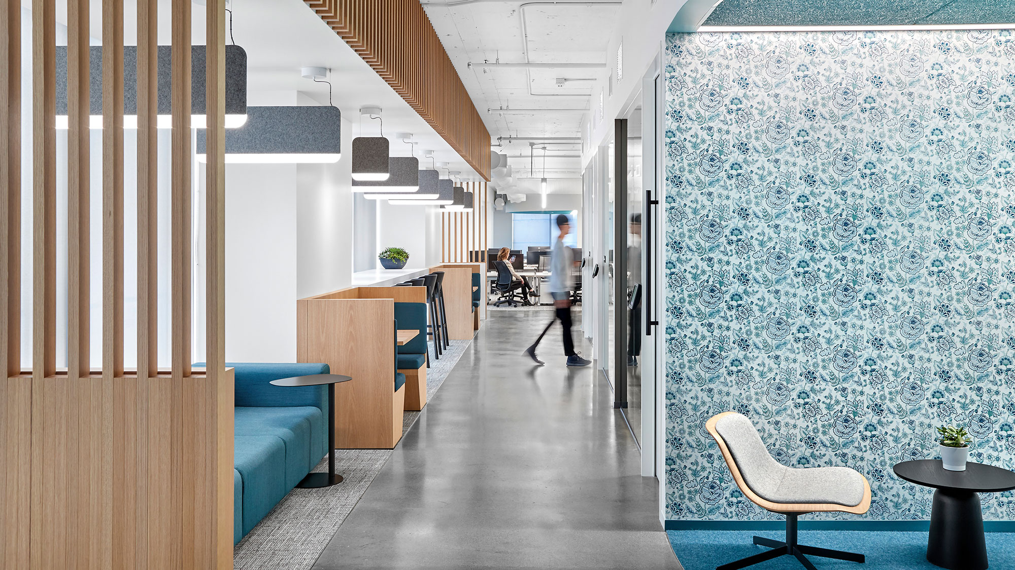 A person walking in a room.