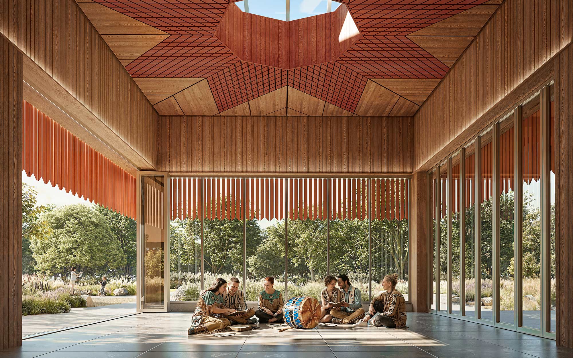 A group of people sitting on a stage under a roof.