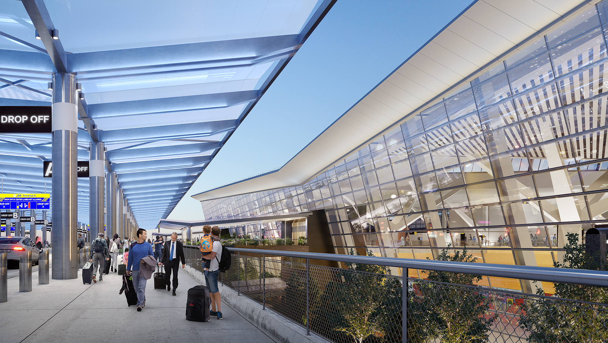 People with luggage walking in a large building.
