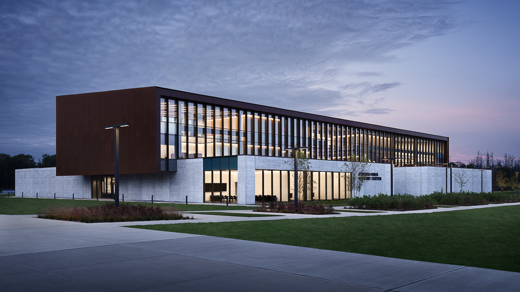 A building with a lawn in front.