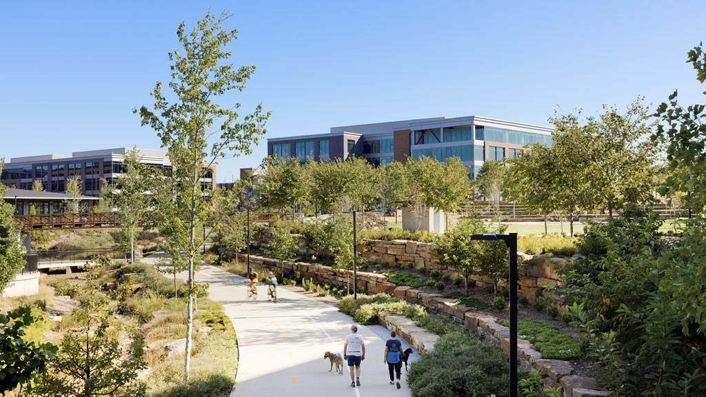 People walking a dog.