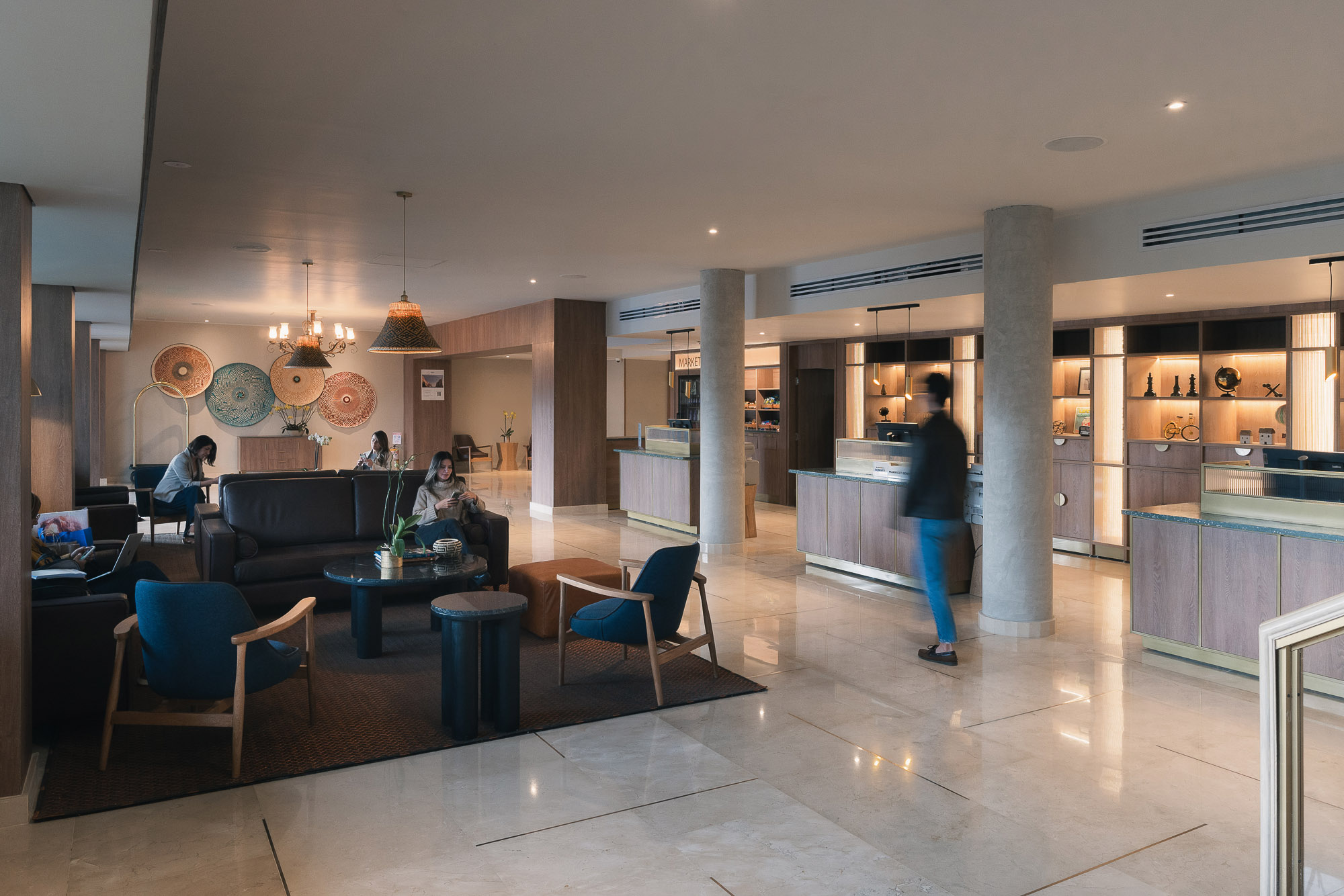 A person walking in a large room.