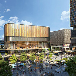 A large building with a glass front.