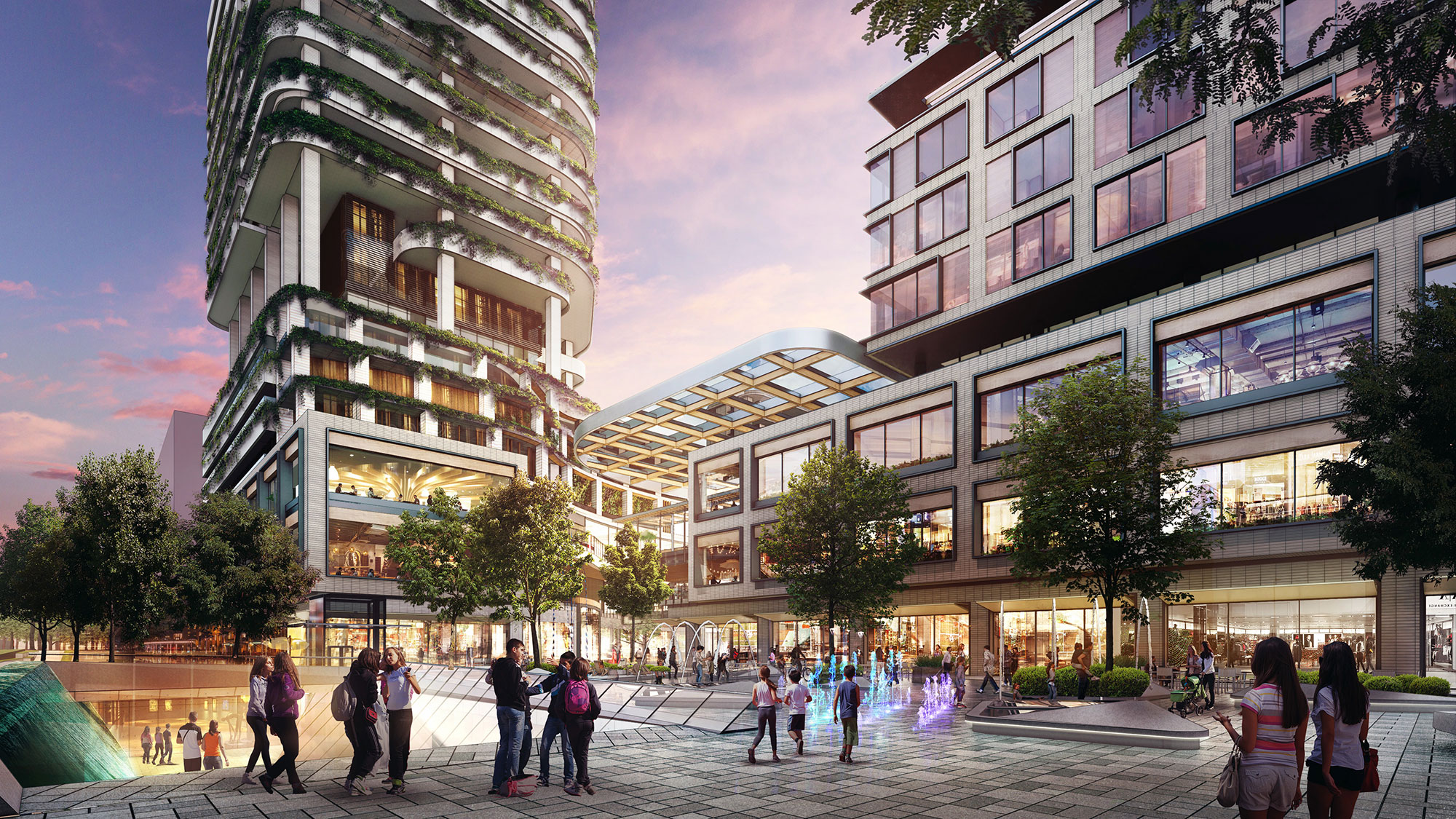 A group of people walking around a courtyard with buildings in the background.