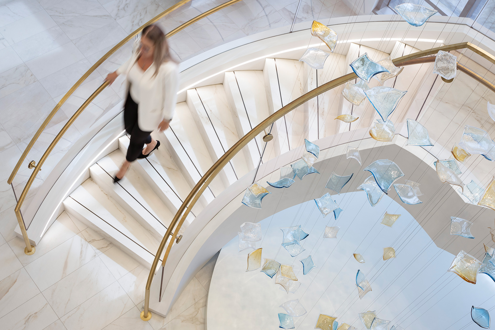 A person walking up a staircase.