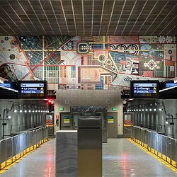 A large room with signs and lights.