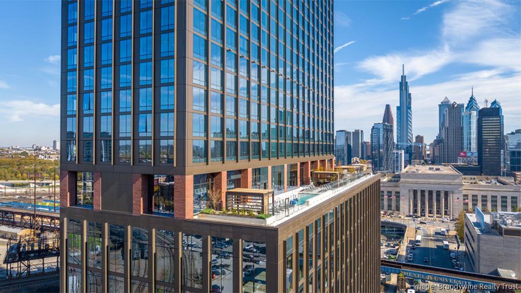 A building with a city in the background.