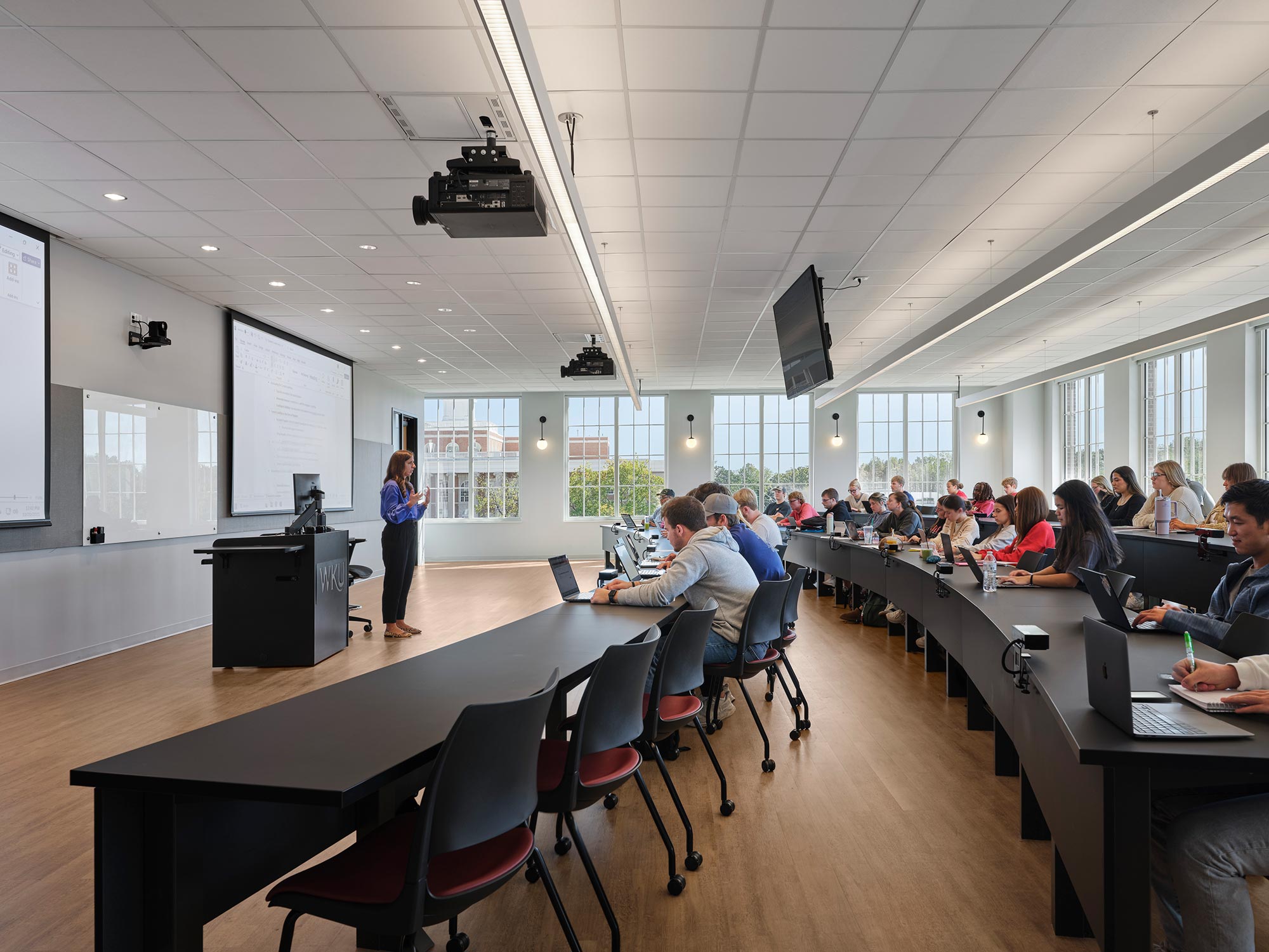 A group of people in a meeting.