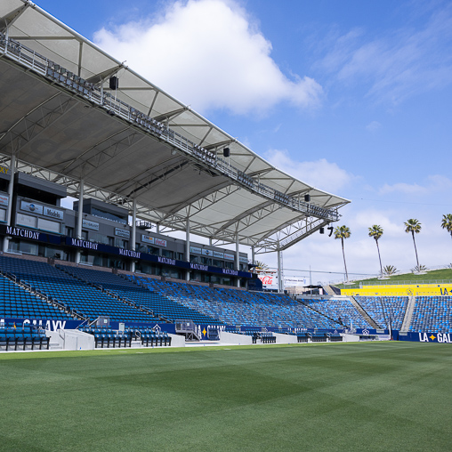 A sports stadium with a field.