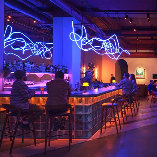 People sitting at a bar.