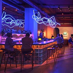 People sitting at a bar.