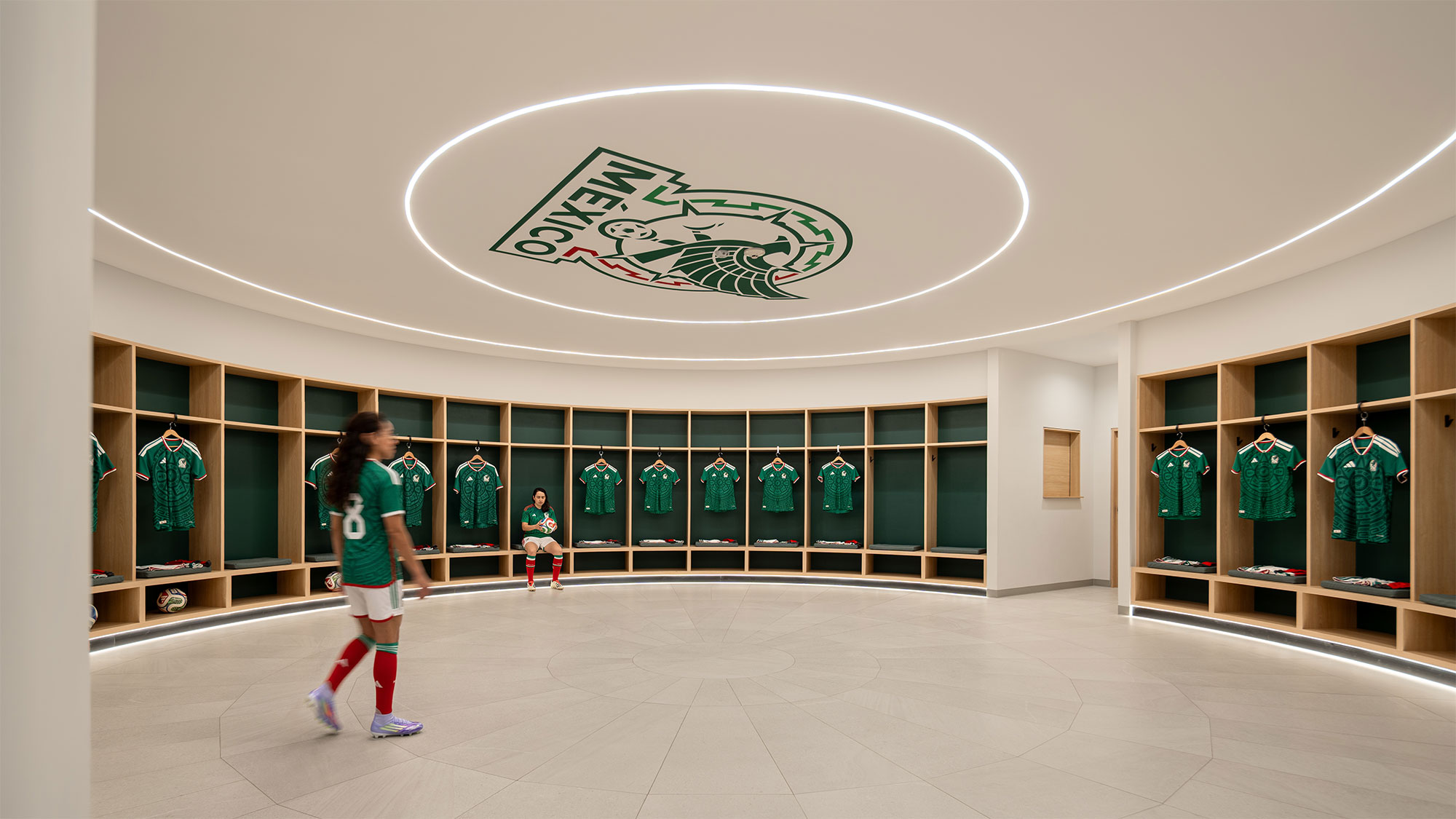 A girl in a green jersey.