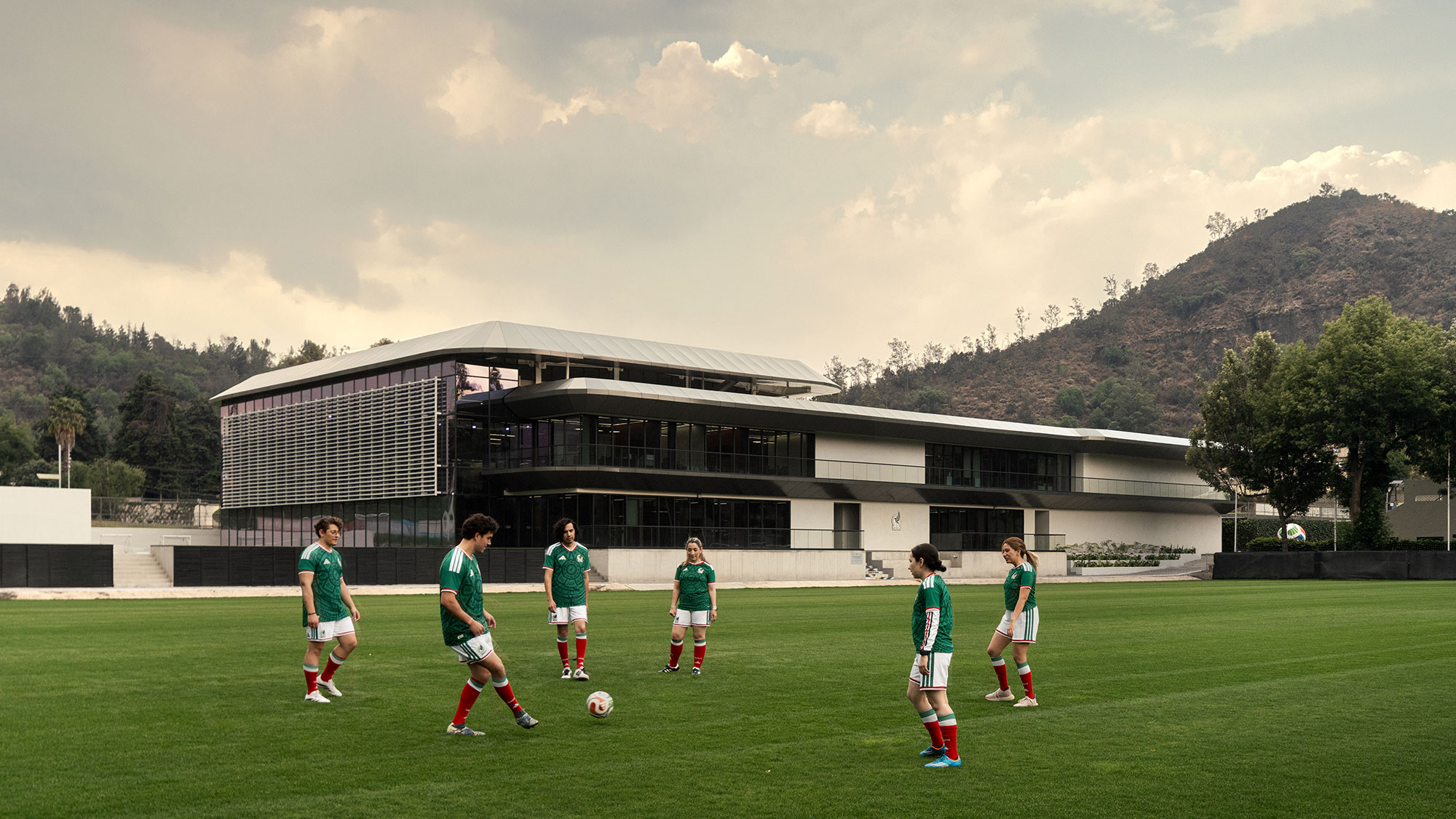 A group of kids playing football.